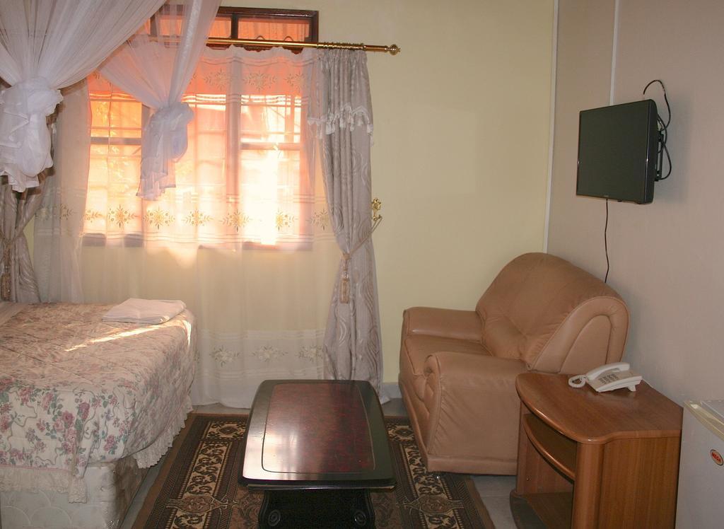 Hotel Acacia Kampala Rum bild